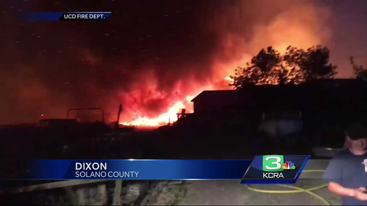 Grass fire torches barn in Dixon
