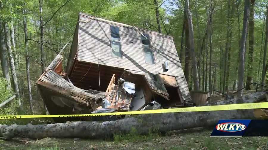 Louisville family escapes through window after tree falls ...