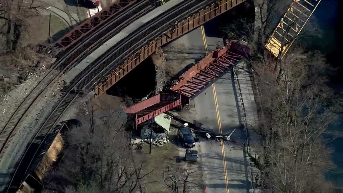 Photos: Freight train derails on bridge in north Baltimore