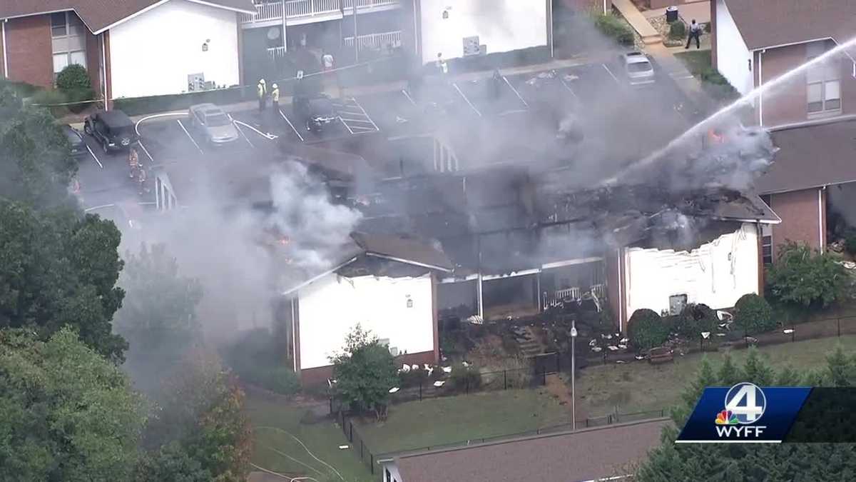 Firefighters battle fire at apartment complex in Greenville
