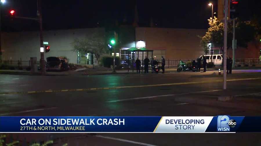 Car on sidewalk crash
