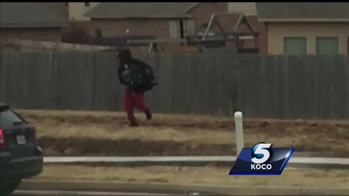 Man caught on camera jumping fence after burglary at metro home - KOCO
