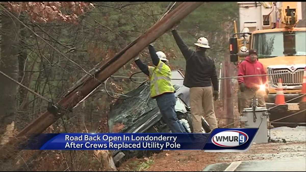 Two rescued after car strikes utility pole, downs live wires Friday