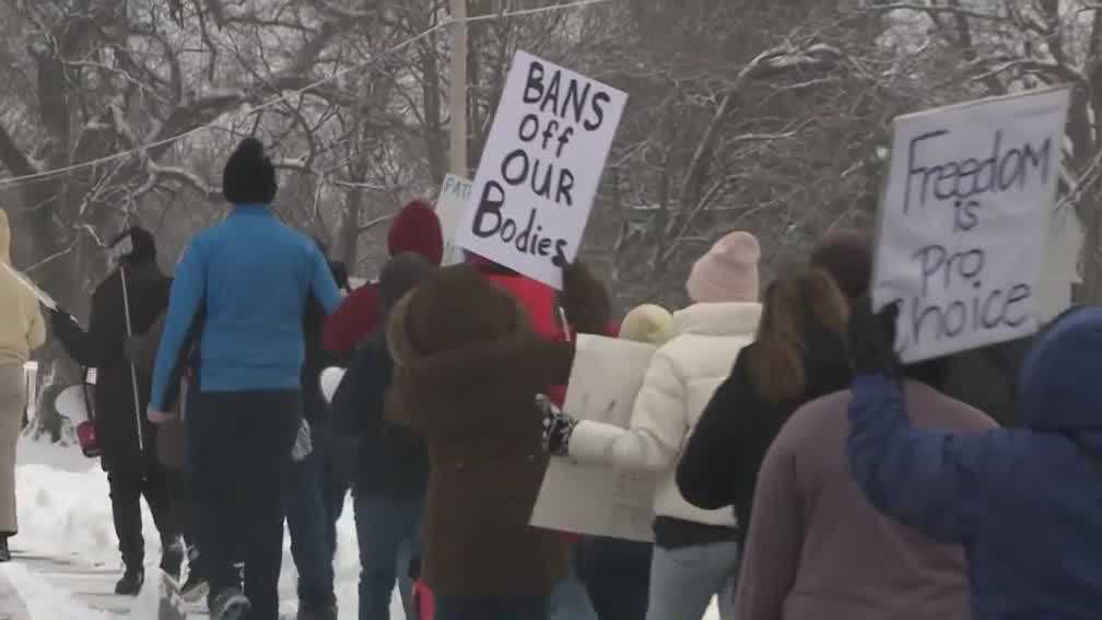 Women's march held in West Des Moines on the 50th anniversary of Roe v ...