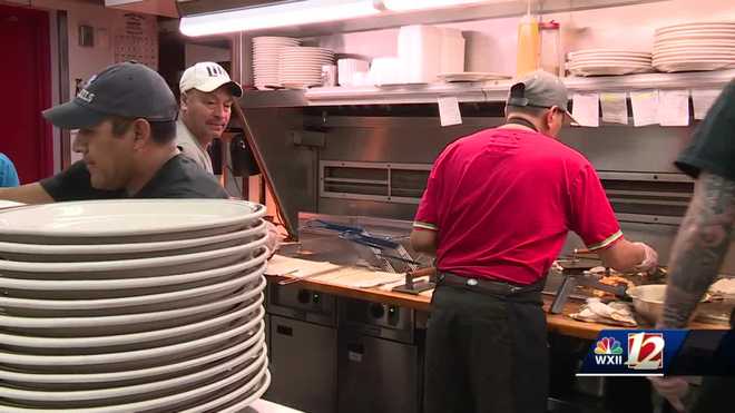 workers&#x20;at&#x20;zoe&#x27;s&#x20;family&#x20;restaurant