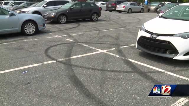Parking lots on Robinhood Road covered in tread marks from car burnouts - Vimarsana News