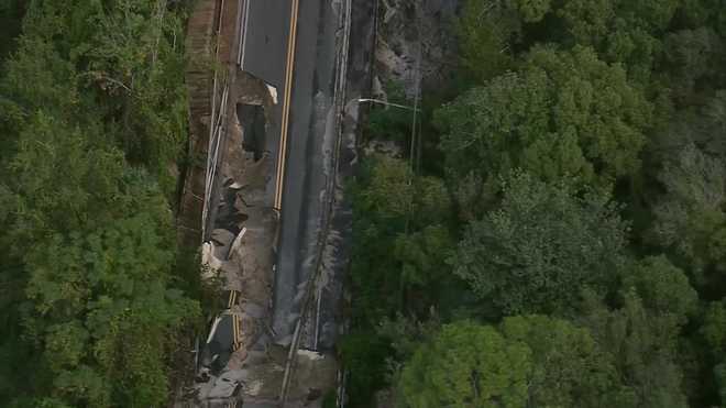 ﻿Several roads washed out after torrential rain in Lake County on Sunday