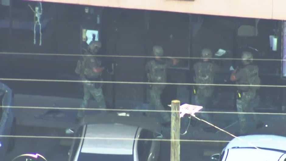 Questions remain in Orlando SWAT standoff that left tattoo artist dead | What we know