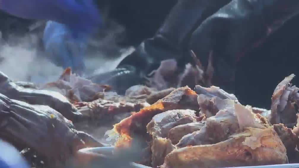 Community gathers for 21 Turkey Salute, serving hundreds on Thanksgiving Eve