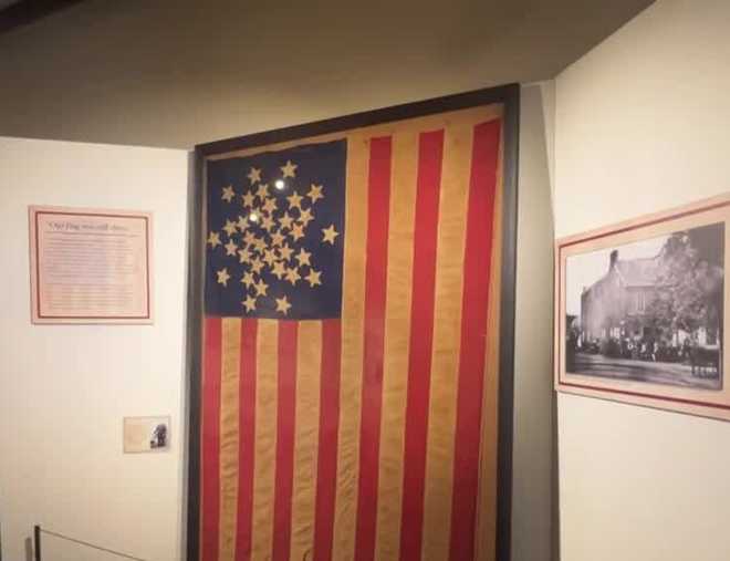 a historic american flag that flew proudly above gettysburg as soldiers returned from battle in 1863 is now on public display for the first time.