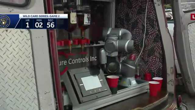 Robotic bartender serves up drinks at Brewers tailgate - Vimarsana News