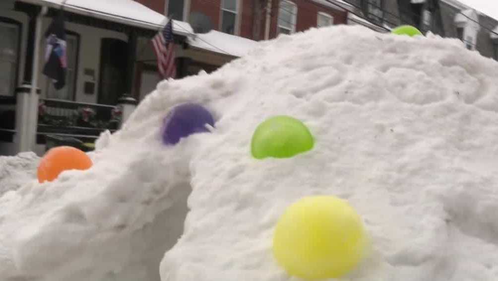 Pennsylvania family builds colorful snow fort from snowplow piles