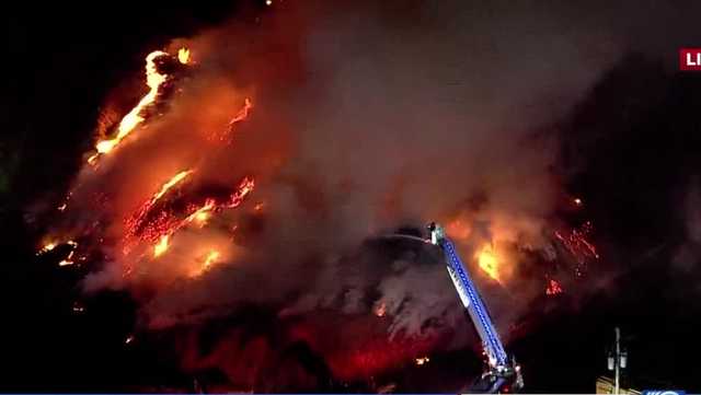 More than 20 fire departments respond to massive fire at pallet factory - Vimarsana News
