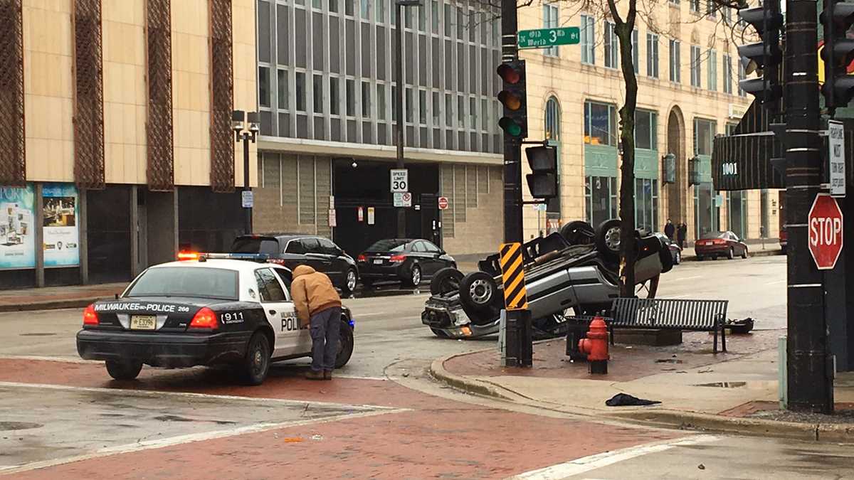 Car flipped in crash during downtown power outage