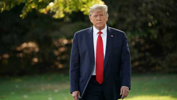 President Donald Trump is shown outside.