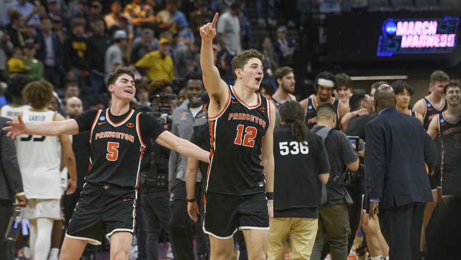Princeton guard Ryan Langborg (3) and forward Caden Pierce (12) celebrate the team's win over Missouri in a second-round college basketball game in the men's NCAA Tournament in Sacramento, Calif., Saturday, March 18, 2023. Princeton won 78-63.