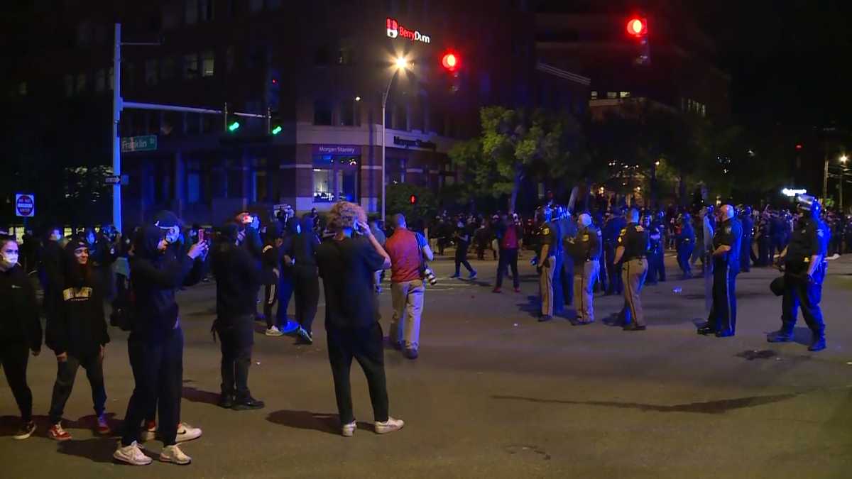 23 arrested, businesses damaged as tensions rise between protesters