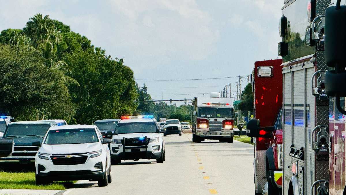 A Florida police officer shoots and kills a man armed with an explosive device in his home