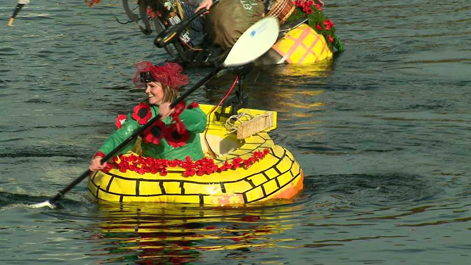 Erin paddles for glory in a gourd in Goffstown
