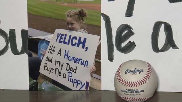 Brewers' Christian Yelich surprises Muskego girls with puppy