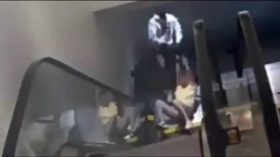 Video Thief Drags Woman Down Mall Escalator As He Tries To Take Her Purse