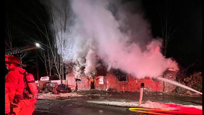 Road shut down for hours as crews put out Putney house fire