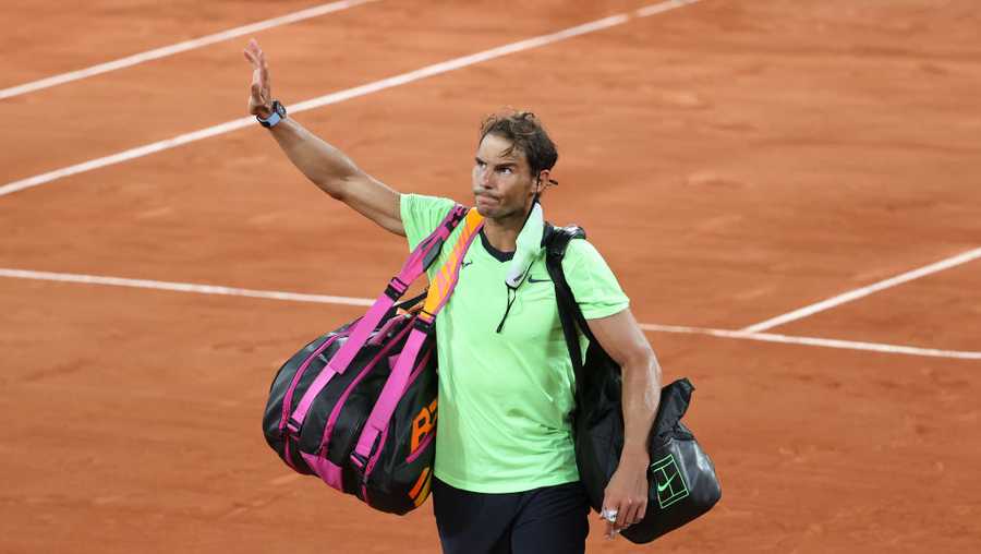 Rafael Nadal of Spain salutes the fans while leaving the court after his semi-final defeat againt Novak Djokovic of Serbia during day 13 of the French Open 2021, Roland-Garros 2021, Grand Slam tennis tournament at Roland Garros stadium on June 11, 2021 in Paris, France.