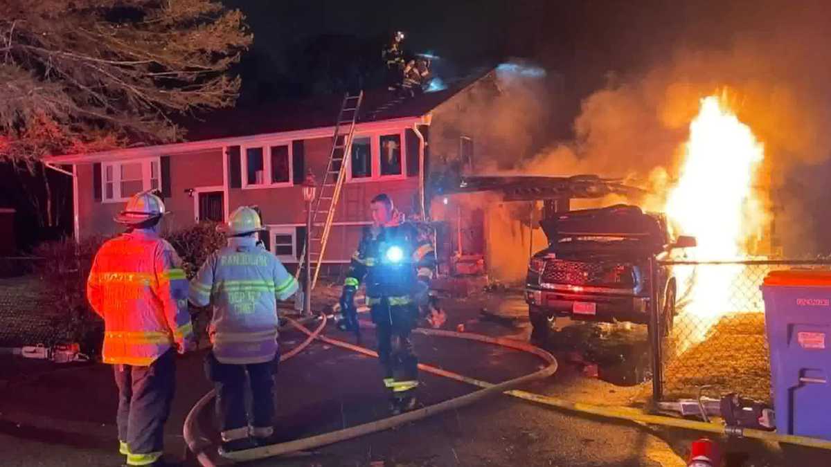 Seven people displaced after garage fire spreads to Randolph home