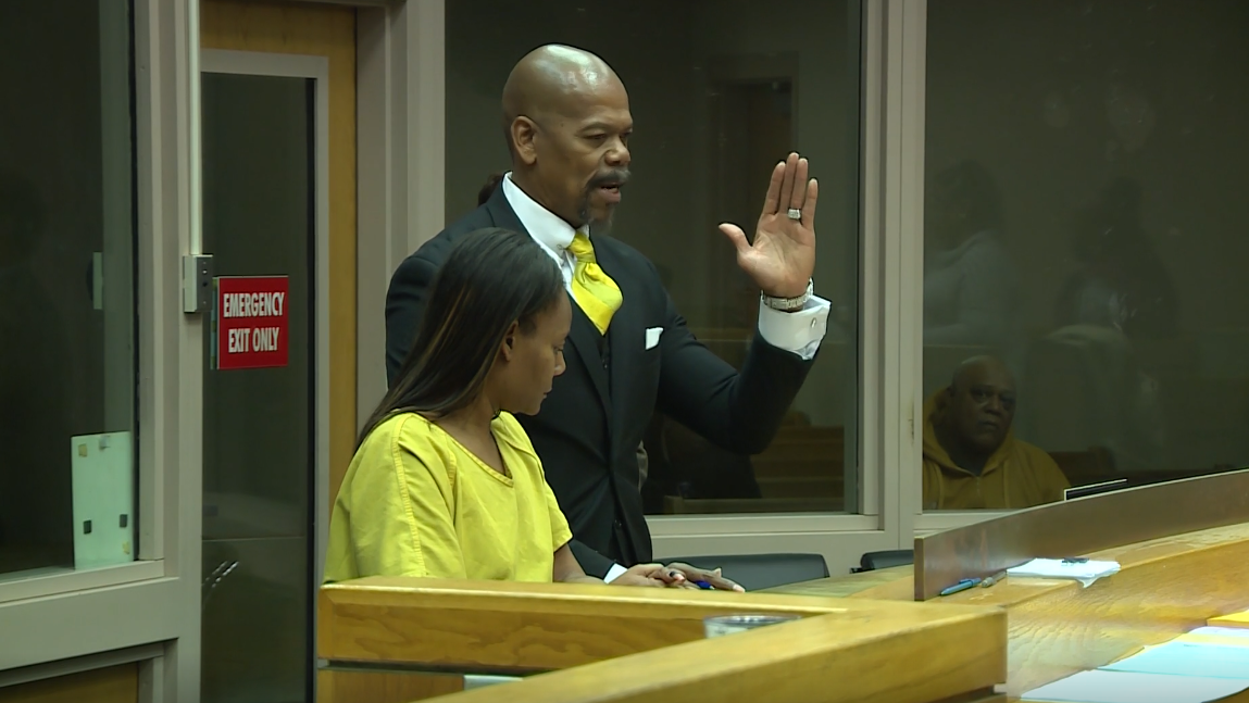 Woman accused of killing father for his home appears in court