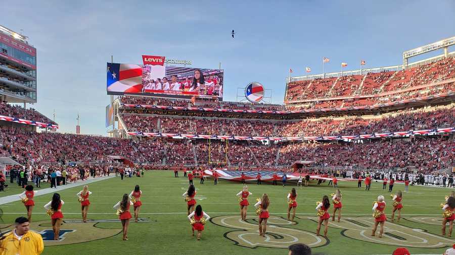 
                                     <p>A San Francisco 49ers cheerleader kneeled during the national anthem ahead of Thursday night's home game against the Oakland Raiders.</p> 
                                