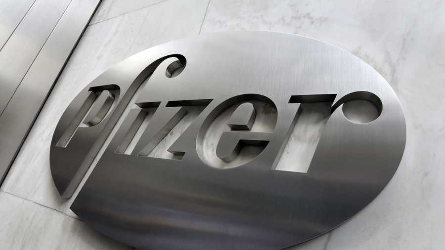 This Monday, Dec. 4, 2017, photo shows the Pfizer company logo at the company's headquarters in New York. 