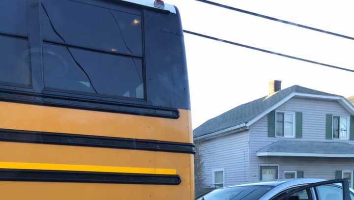 Man charged with OUI after rear-ending school bus, police say
