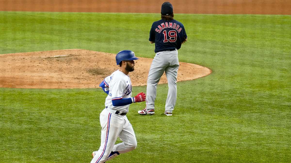 Hirokazu Sawamura of the Boston Red Sox pitches in a baseball game