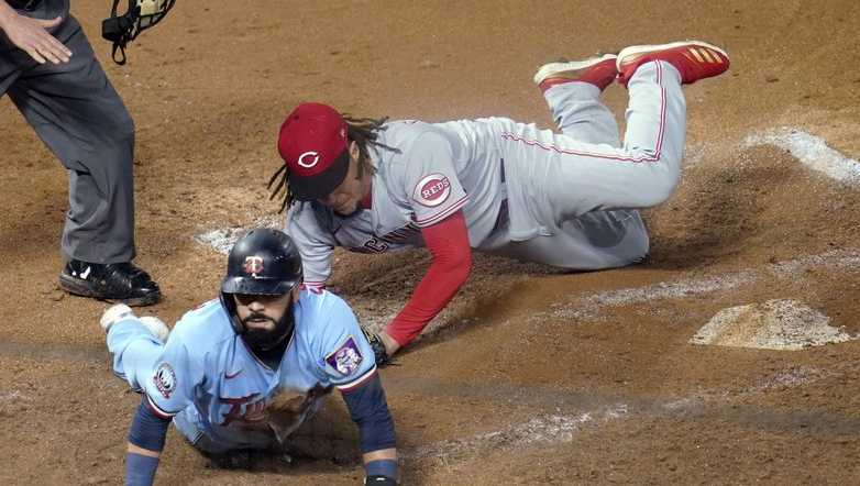 Twins beat Reds 7-3 at home