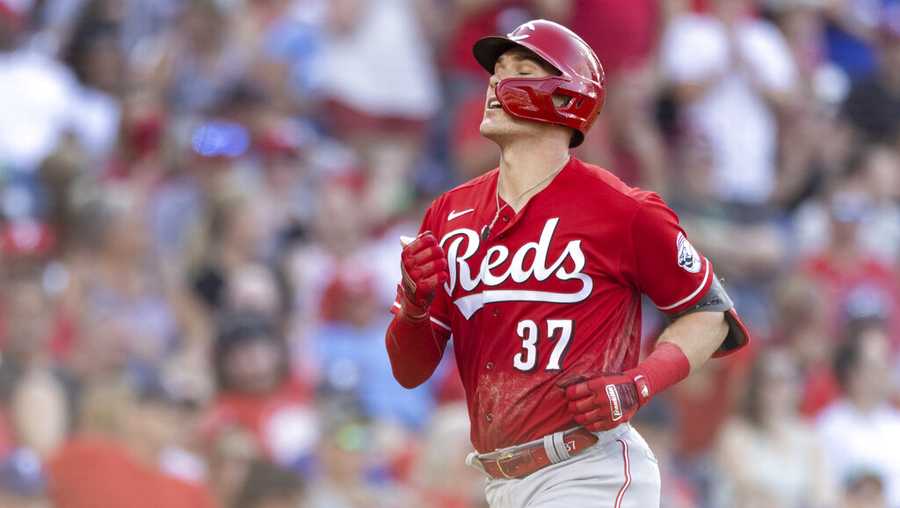 Cincinnati Reds&apos; Tyler Stephenson runs home after hitting a home run during the eighth inning of a baseball game against the Philadelphia Phillies, Saturday, Aug. 14, 2021, in Philadelphia. (AP Photo/Laurence Kesterson)