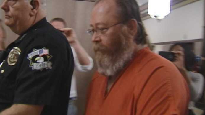 Confessed serial killer returned to Oklahoma, where he awaits execution