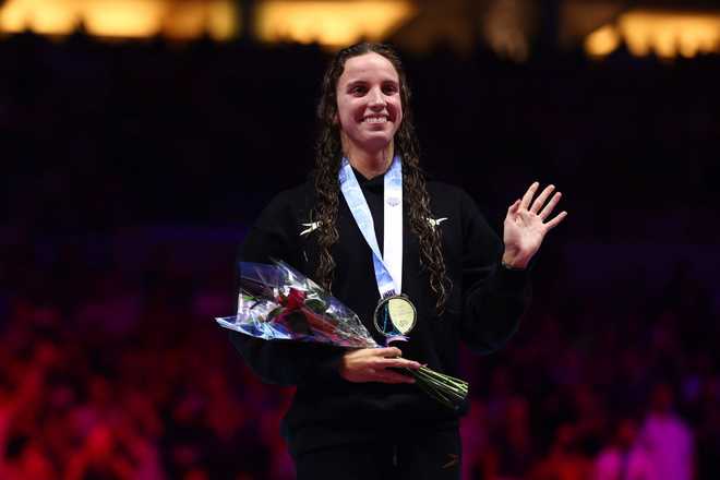 INDIANAPOLIS,&#x20;INDIANA&#x20;-&#x20;JUNE&#x20;18&#x3A;&#x20;Regan&#x20;Smith&#x20;of&#x20;the&#x20;United&#x20;States&#x20;reacts&#x20;during&#x20;the&#x20;Women&amp;apos&#x3B;s&#x20;100m&#x20;backstroke&#x20;final&#x20;medal&#x20;ceremony&#x20;on&#x20;Day&#x20;Four&#x20;of&#x20;the&#x20;2024&#x20;U.S.&#x20;Olympic&#x20;Team&#x20;Swimming&#x20;Trials&#x20;at&#x20;Lucas&#x20;Oil&#x20;Stadium&#x20;on&#x20;June&#x20;18,&#x20;2024&#x20;in&#x20;Indianapolis,&#x20;Indiana.&#x20;&#x28;Photo&#x20;by&#x20;Maddie&#x20;Meyer&#x2F;Getty&#x20;Images&#x29;
