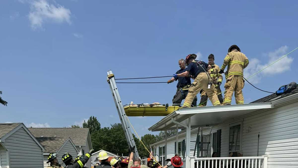 Firefighters rescue man stuck on roof of mobile home in Lancaster ...
