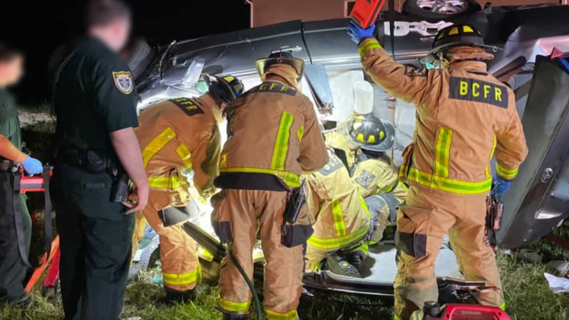 DRAMATIC IMAGES: Rescuers Pull Person From Car Following Crash In Front ...