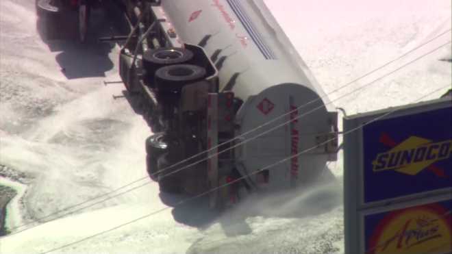 Tanker truck crashes, leaks fuel onto busy rotary in Revere