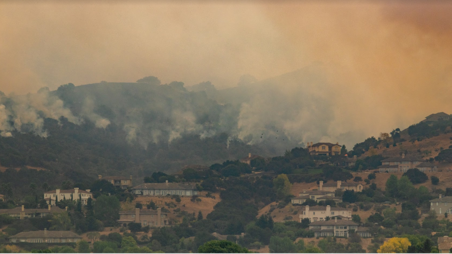 The River Fire burns above homes in Monterey County, Aug 19