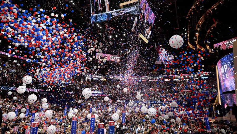 Balloons fall over the crowd as Donald Trump accepts the Republican Party's nomination as presidential candidate, at the end of the Republican National Convention on July 21, 2016. The Republican National Convention in Jacksonville, Florida, will feature daily coronavirus testing for those attending the event.