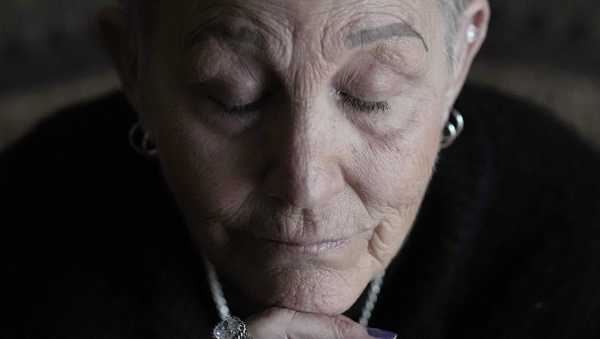 Deb Robertson sits for a portrait at her Lombard, Ill. home, Thursday, March 21, 2024