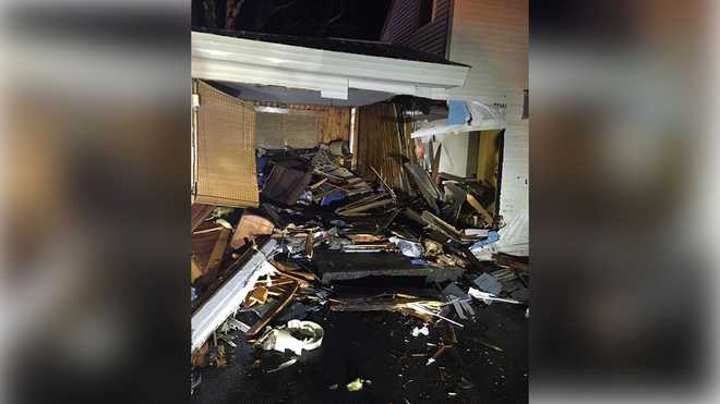 Driver missing after pickup truck crashes into Rochester home