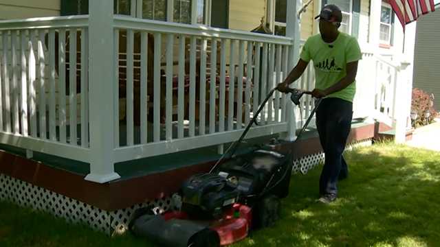 Rodney Smith Jr. mows a lawn as part of his nationwide outreach.