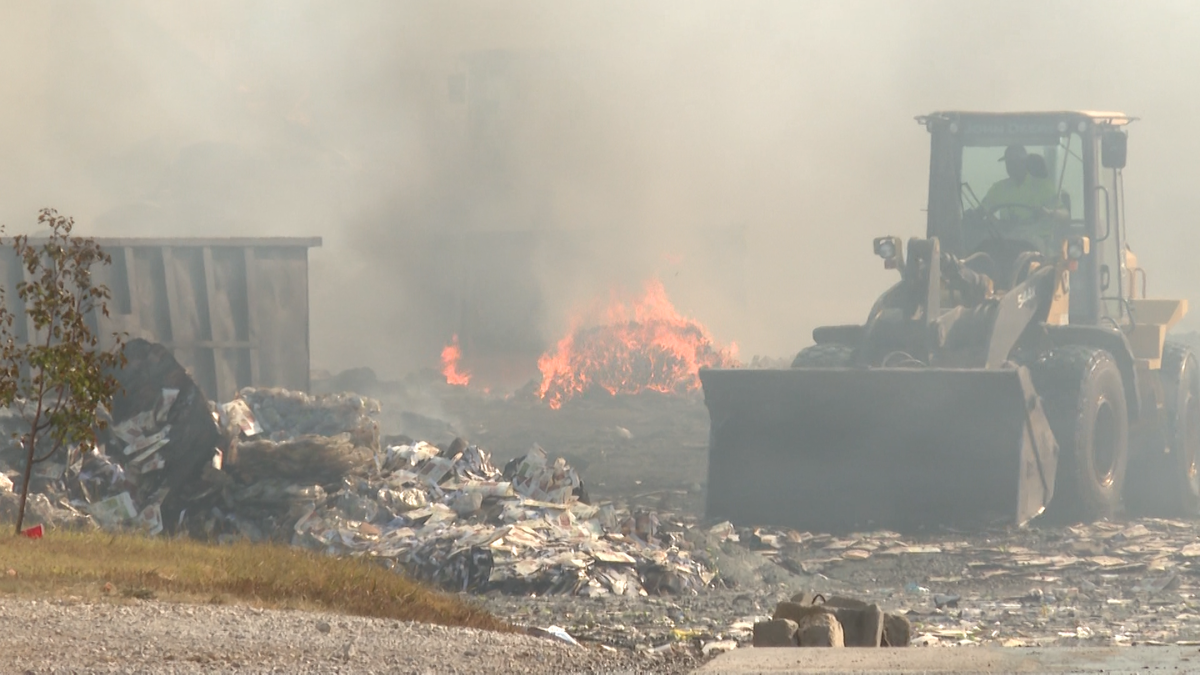 Rogers fire crews work to extinguish recycling center blaze