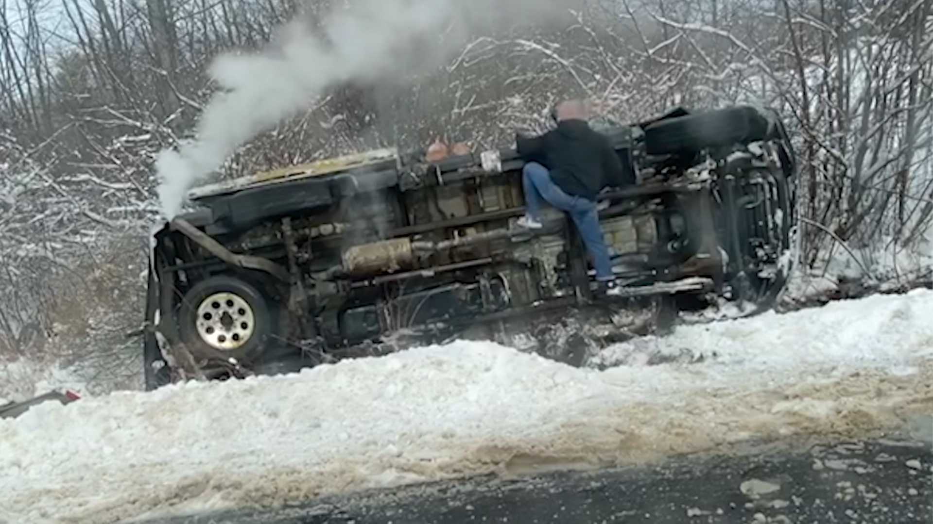 Video Shows Man Rush To Rescue Driver Trapped After Rollover Crash On ...