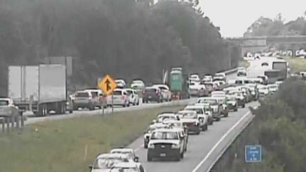 Coroner IDs woman killed in crash on Ronald Reagan Highway