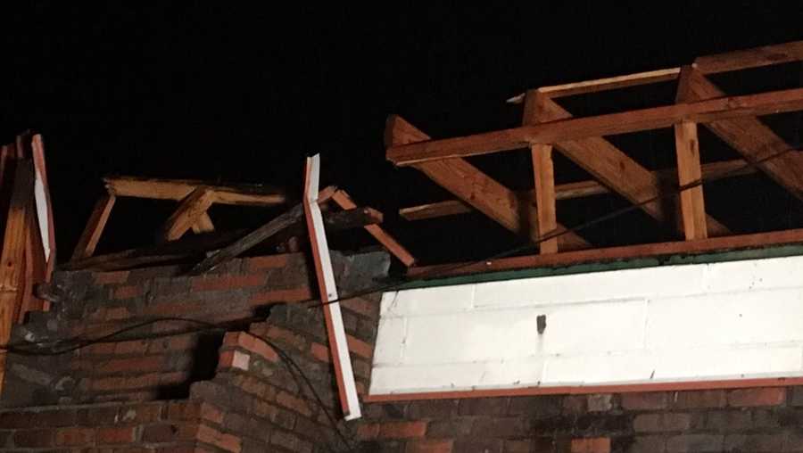 Strong storms tear the roof off a building in Marion County, Ala.