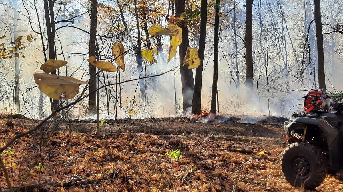 Multiple fire departments battling brush fire in Fayette County